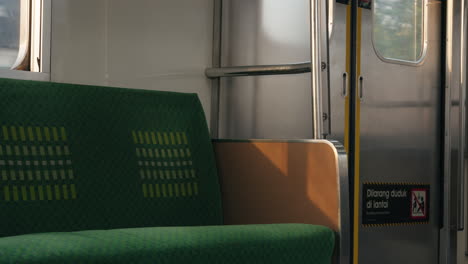 moving-sunlight-on-the-handle-train-seat-close-up