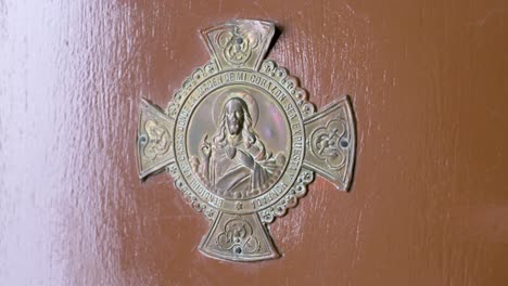 Image-of-a-Jesus-Christ-decorative-door-figure-is-seen-at-a-home's-door-to-welcome-guests