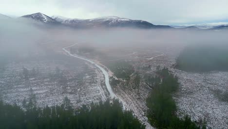 Aerial-ascending-footage-of-winter-highlands
