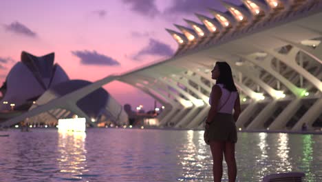 Tourist-woman-visit-science-and-arts-city-in-Valencia,-Spain-at-sunset