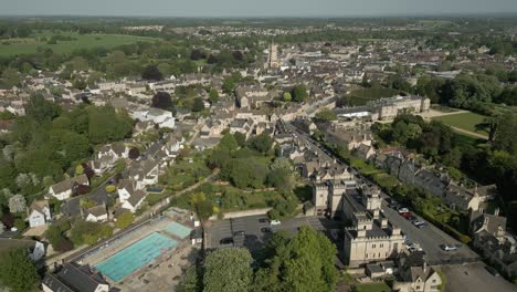 Cirencester-Park-Open-Air-Swimming-Pool-Town-Church-Aerial-Landscape-Cotswolds-UK-Spring