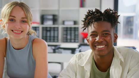 Close-Up-Portrait-Of-Smiling-Multi-Cultural-High-School-Or-Secondary-Pupils-In-Class