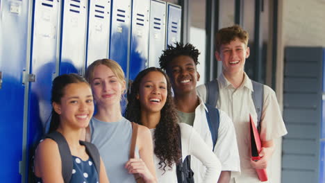 Portrait-Of-Multi-Cultural-High-School-Or-Secondary-Students-Standing-By-Outdoor-Lockers
