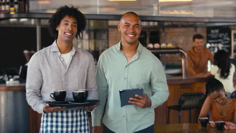 Portrait-Of-Male-Staff-Team-Working-In-Restaurant-Or-Coffee-Shop