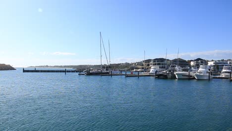 Idyllic-ocean-water-under-a-beautiful-blue-sky-at-Mindarie-Marina,-Perth