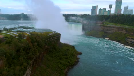 Aerial-Niagara-Horseshoe-Falls-Toronto-Canada-Skyline-Flyover-Cinematic-Dramatic-Toronto-Canada-Orbit-Skyline-Pre-Dawn-Waterfall-Urban-River-Flight-Mist-Landmark-Usa-Tourist-Destination
