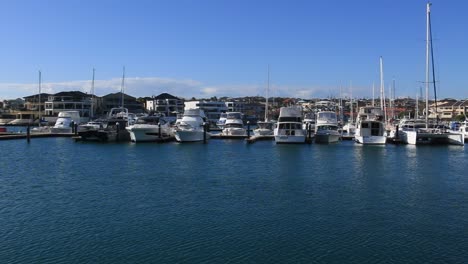 An-impressive-line-up-of-yachts-and-other-vessels-moored-up-on-a-beautiful-Summer’s-day