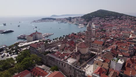 Aerial:-Split's-old-town-nestled-between-mountains-and-the-Adriatic-Sea