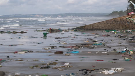 Waves-crash-against-a-beach-covered-in-rubbish-in-Mui-Ne-Vietnam