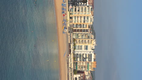 vertical-video-of-Blanes-on-the-Costa-Brava-of-Girona-Main-beach-blue-copy-space-sea-in-the-foreground