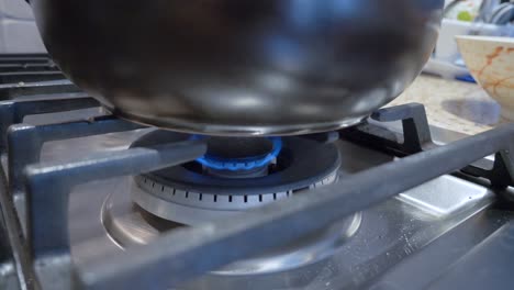 gas-stove-range-in-kitchen-burning-minimum-fire