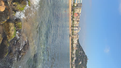 Vertical-video-of-the-Mediterranean-Sea-with-blue-sky-and-copy-space-in-Blanes-Costa-Brava
