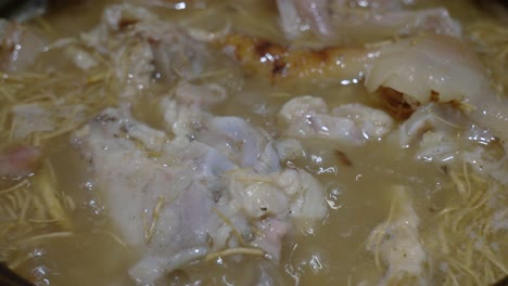 slow-cooking-ginseng-pork-bone-soup-stew-boiling