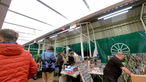 POV-looking-around-British-flea-market-at-variety-of-disposable-unwanted-objects-for-a-cheap-bargain
