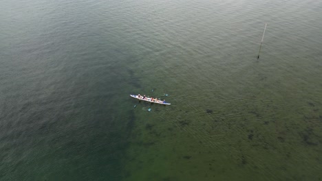 Rowers-rowing-on-the-open-sea-with-no-waves