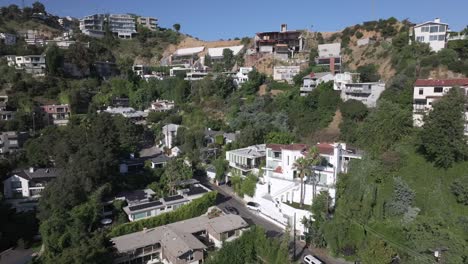 Aerial-of-Hollywood-exclusive-mansion-of-homes,-flyover-showing-the-rich-and-famous