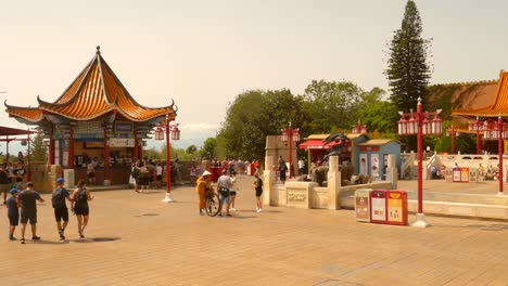 Pan-shot-of-China-area-port-inside-Port-Aventura-amusement-park-in-Port-Aventura,-Salou,-Spain-on-a-sunny-day