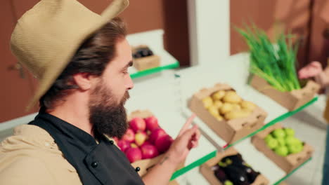 Man-films-vlog-in-vegan-food-supermarket
