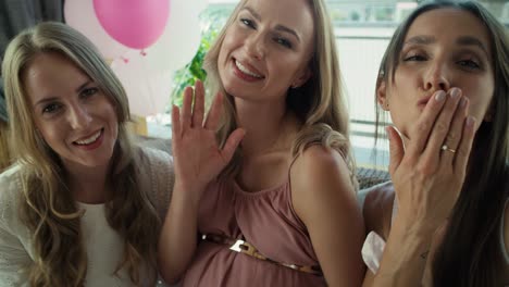 Group-of-women-talking-by-video-call-from-baby-shower.