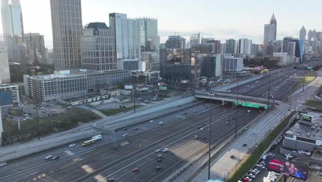 Aerial-timelapse-of-Downtown-Atlanta-highway-traffic,-Downtown-Connector-multi-lane-expressway-busy-road,-Georgia,-USA