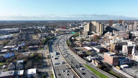 Panoramic-aerial-view-of-traffic-on-Downtown-Connector-Interstate-highway-during-the-daytime,-Atlanta,-Georgia,-USA