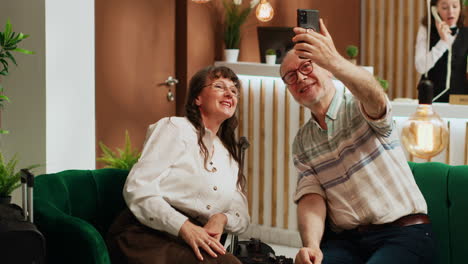 Elderly-couple-taking-pictures-at-hotel