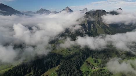 Aerial-View-of-Mystical-Mountains:-Capturing-the-Beauty-of-Green-Peaks-and-Clouds