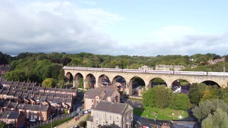 Train-crossing-viaduct-in-Durham-Town-centre---Aerial-Drone-4K-HD