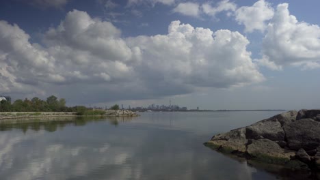 Downtown-Toronto-And-Lake-Ontario-View-From-Humber-Bay,-Dramatic-Clouds