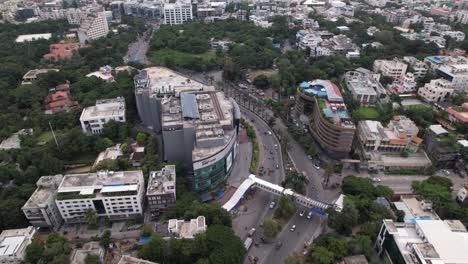 Aerial-Cinematic-Footage-Of-Hyderbad-Mall-Filled-With-Car-And-People