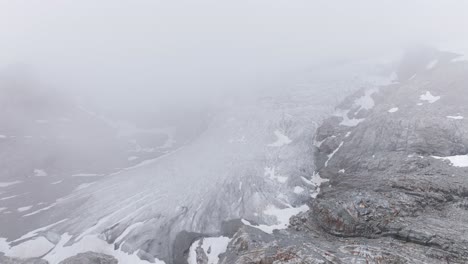Fellaria-Glacier-shrouded-in-fog-during-summer-season,-Valmalenco-in-Italy