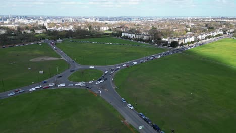 Traffic-queuing-on-roundabout-Blackheath-Southeast-London-drone,aerial