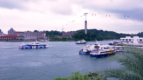Passenger-vessels-sailing-in-front-of-Sentosa-Island-in-Singapore