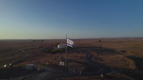 The-flag-symbolizing-Israel's-war-is-in-the-Golan-Heights-on-the-Tel-Saki-bunker-that-was-used-in-the-war,-the-site-of-one-of-the-most-critical-battles-of-the-Yom-Kippur-War-on-1973