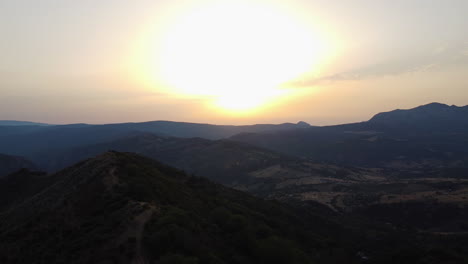 A-drone-flies-over-the-mountains-in-Pico-De-Los-Reales-in-Estepona-Spain