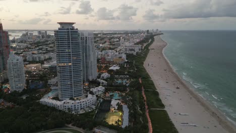 Aerial-Drone-Fly-Above-Miami-South-Beach,-Sea-Coast-Resorts-and-Dayline-Skyline,-United-States-of-America-Travel-Destination