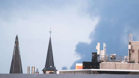 Pull-back-from-a-column-of-smoke-over-a-steeple