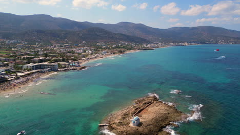Aerial:-Beautiful-Coastline-And-Turquoise-Water-Of-Malia,-Crete