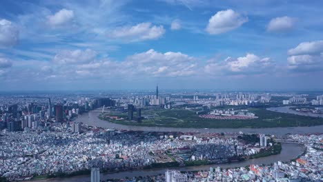 Ho-Chi-Minh-City-drone-fly-in-on-sunny-day-with-blue-sky-and-moving-clouds