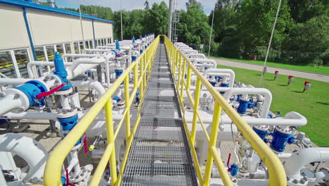 Steel-Walkway-Over-The-Distribution-Pipeline-System-At-Compressor-Station-Facility