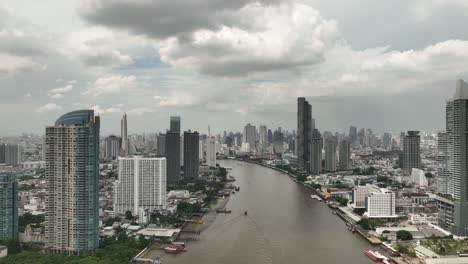 Aerial-Shot-of-River-in-Downtown-Bangkok,-Thailand