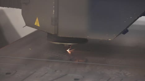 Machine-Laser-Cutting-Sheet-Metal-at-a-Factory,-Close-Up-Shot