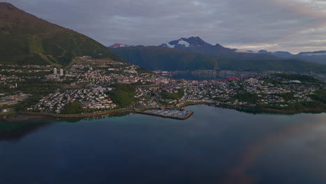 Establishing-aerial-shot-of-Narvik-on-coastline-in-Nordland,-Norway