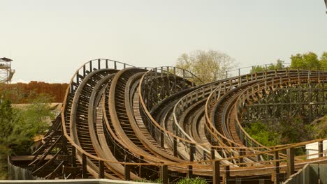 People-riding-the-Stampida-roller-coaster-in-Port-Aventura-Park,-Spain