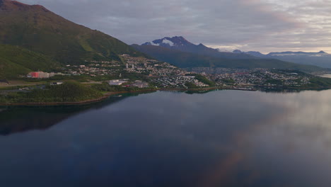 Sunset-aerial-view-over-Narvik-town-along-Ofotfjorden,-Arctic-Norway