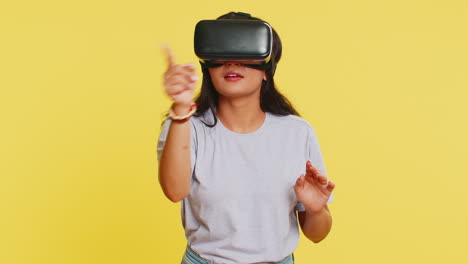Excited-woman-in-VR-headset-helmet-watching-virtual-reality-3D-video,-playing-simulation-online-game