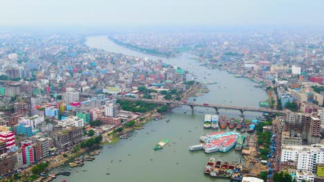 Buriganga-river-Bridge-and-the-surrounding-area-of-Dhaka-City,-Aerial