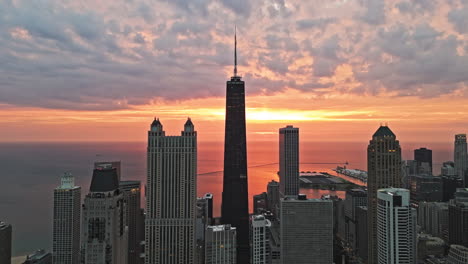 Aerial-tracking-shot-in-front-of-high-rise-in-Streeterville,-colorful-morning-in-Chicago
