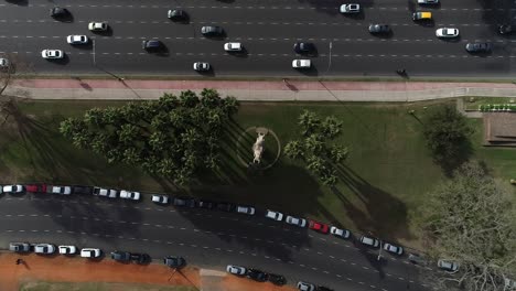 Aerial-overhead-shot-of-an-avenue-in-Buenos-Aires-city-Argentina-during-day-time-with-fluent-traffic-going-on