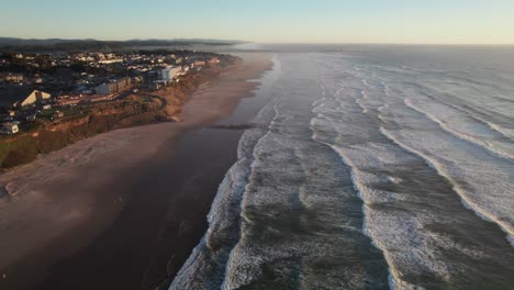 Gorgeous-high-aerial-shot-of-Oregon-coastline-with-beaches-and-crashing-waves